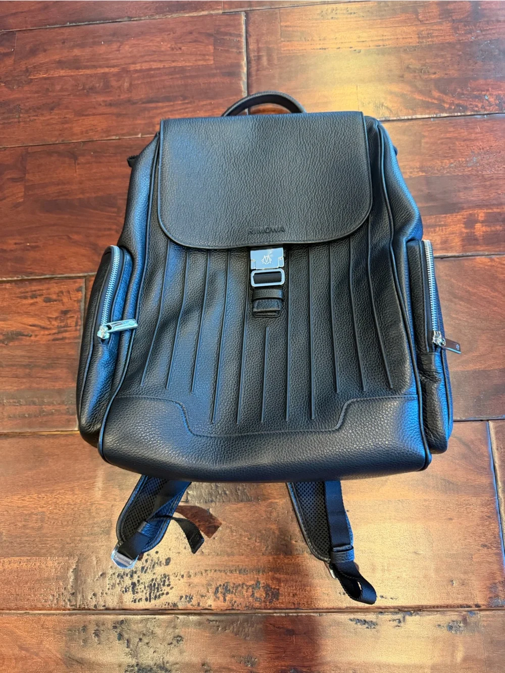 RIMOWA Black Leather Men's Backpack with Front Flap, used only once.
